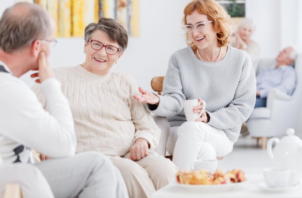 A group of residents in assisted living enjoying their social club.